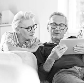 Older couple looking at tablet